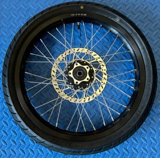 eMoto CST Super Moto CST 17x2.15 rear wheel and tire set for eMoto bikes, made for Talaria, Surron, ERIDE Pro, and Throne, available at eBike Super Shop, designed for enhanced on-road and off-road traction, providing durability and smooth performance across various terrains.