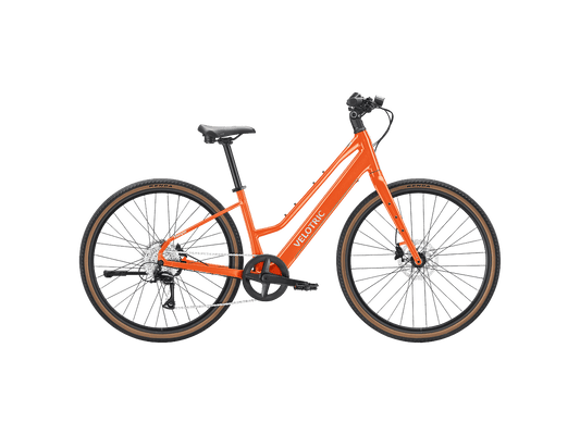Velotric Tempo Mid Step eBike in Sunset Tangerine color, side view, against a plain background