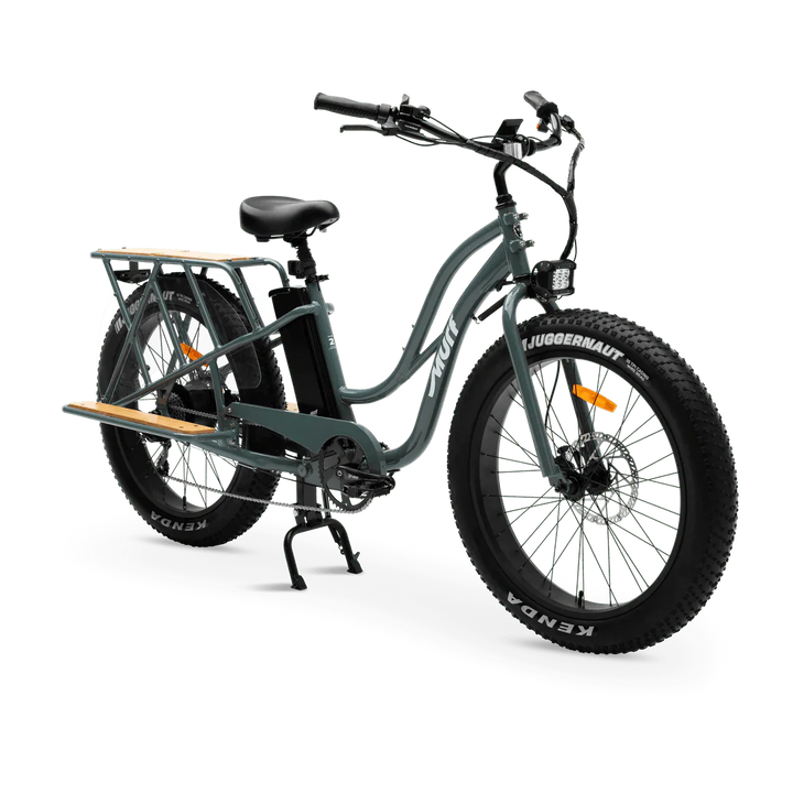 Murf Alpha Cargo fat tire electric beach cruiser e-bike, 52V 750W, designed for carrying cargo, shown in a shop setting.