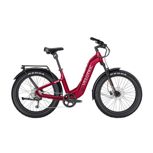 Velotric Nomad 2 electric bike in cranberry red, side view, against a white background