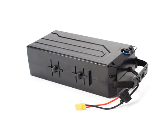 Stomp Ebox 60V stock battery, rectangular black casing with visible wiring and connectors, placed on a white background.