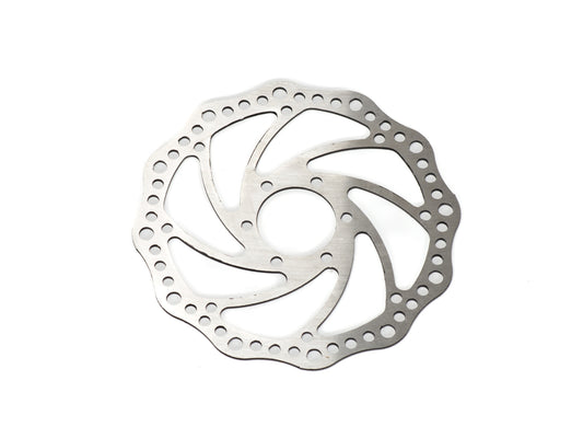 Close-up view of the Stomp Ebox Dragster brake rotor, showing the circular metal disc with precision-drilled holes and a vented design for enhanced braking performance.