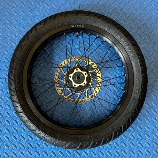 eMoto Michelin Super Moto CST 17x2.15 rear wheel and tire set for eMoto bikes, made for Talaria, Surron, ERIDE Pro, and Throne, available at eBike Super Shop, offering superior traction and durability for smooth and reliable on-road and off-road performance.