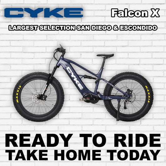Dark blue Cyke Falcon X electric bike, side view, against a plain background.