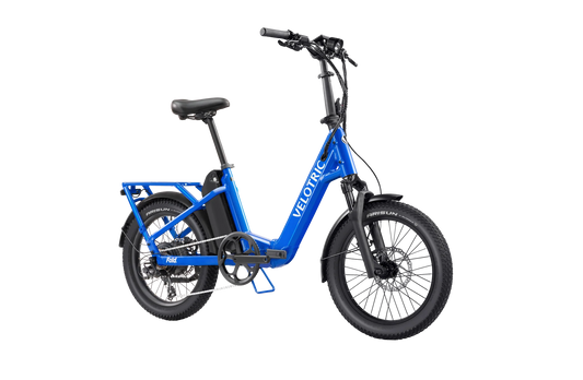 Electric blue Velotric Fold 1 Plus eBike, folded, side view, showcasing compact design and modern frame.