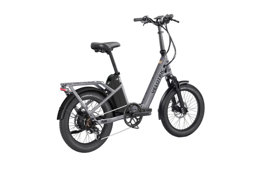 Velotric Fold 1 Plus eBike in Stone Gray, side view, folded for compact storage