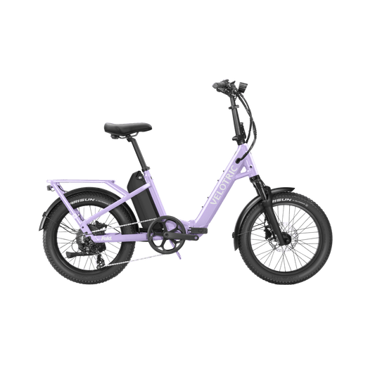 Velotric Fold 1 Plus electric bike in Violet Haze color, folded for compact storage, shown against a plain background.
