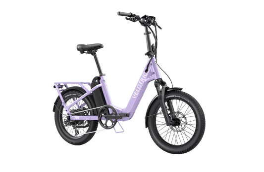 Velotric Fold 1 Plus electric bike in Violet Haze color, shown folded for compact storage
