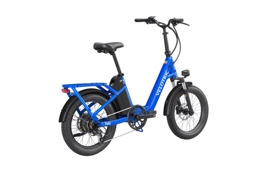 Electric blue Velotric Fold 1 eBike, folded for compact storage, showcasing its sleek design and portability.