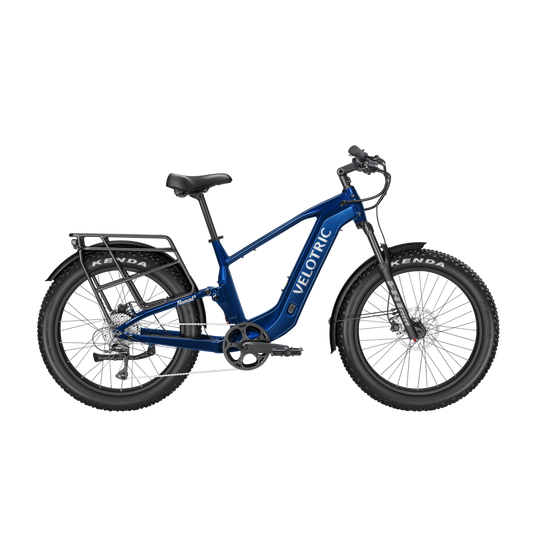 Royal blue Velotric Nomad 2X High Step eBike, side view, against a white background