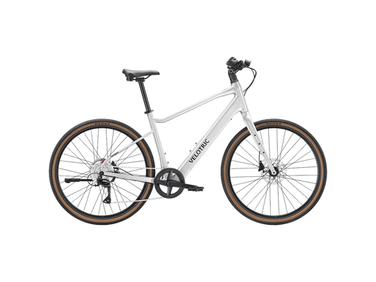 Velotric Tempo High Step eBike in Lightning Silver, side view, showcasing frame design and components